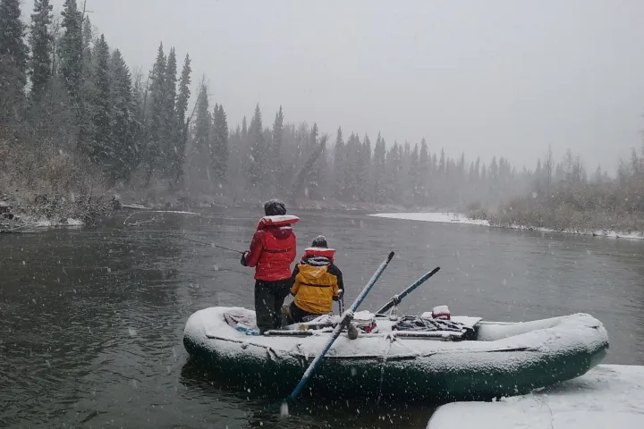 a man water skiing behind a boat
