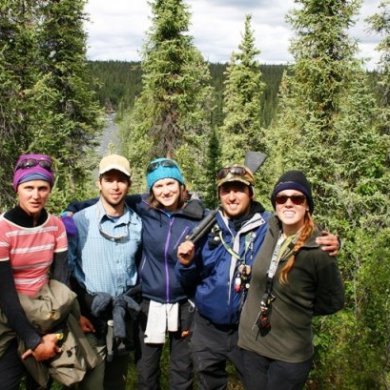 a group of people posing for the camera