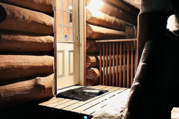 a person sitting in front of a building