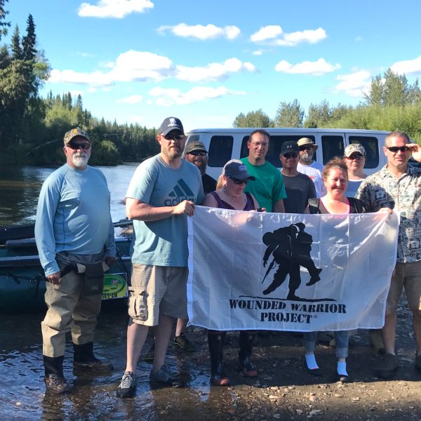 a group of people posing for the camera