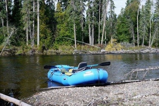 a small boat in a body of water