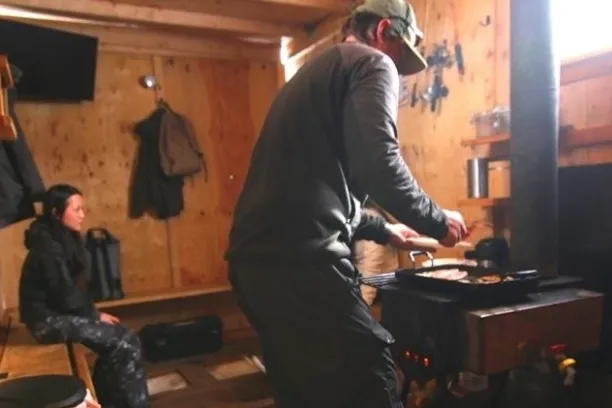 a person standing in a kitchen