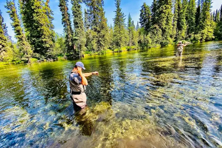 a man in a pond of water