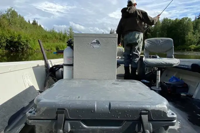 a man riding on the back of a vehicle