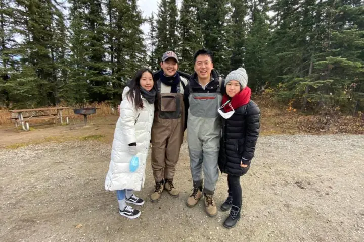 a group of people posing for the camera