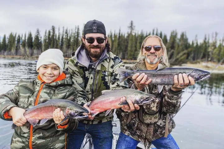 a man holding a fish