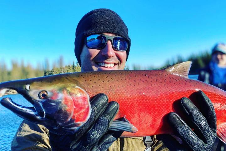 a man wearing sunglasses and a hat