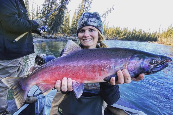 a person holding a fish