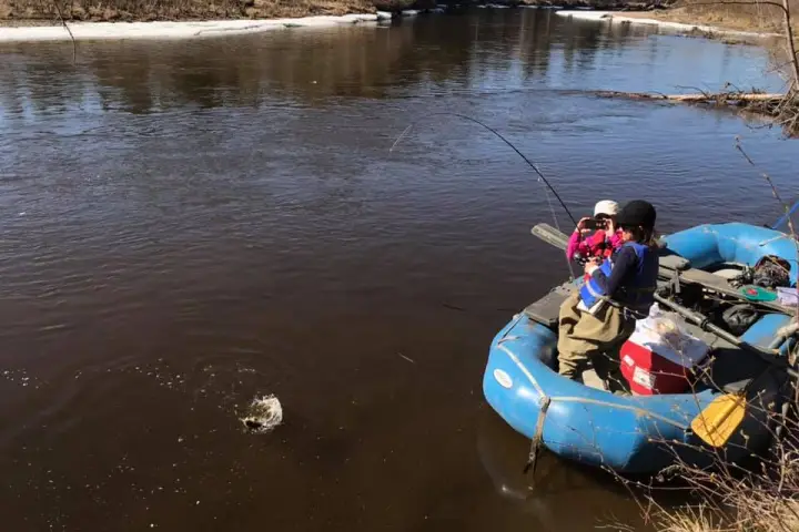 a raft next to a body of water