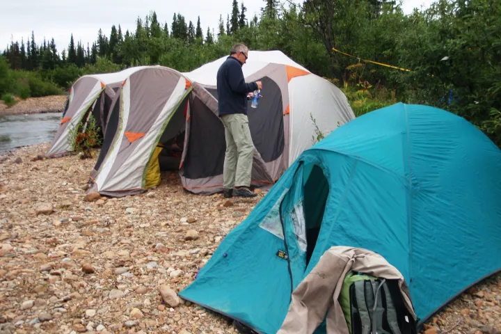 a group of people in a tent