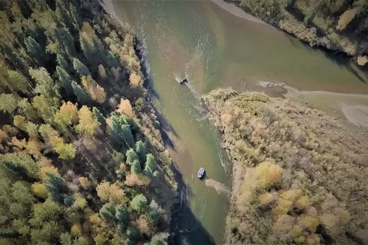 a group of people on a rocky hill