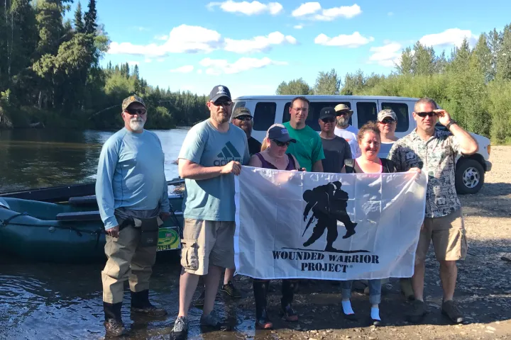 a group of people posing for the camera