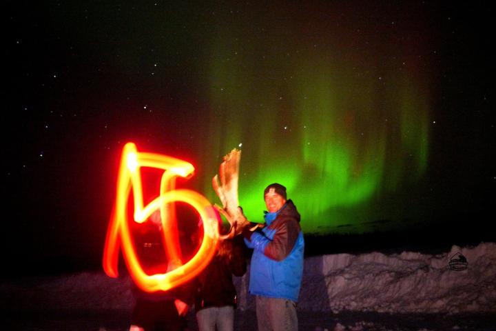 a person standing in front of a fire