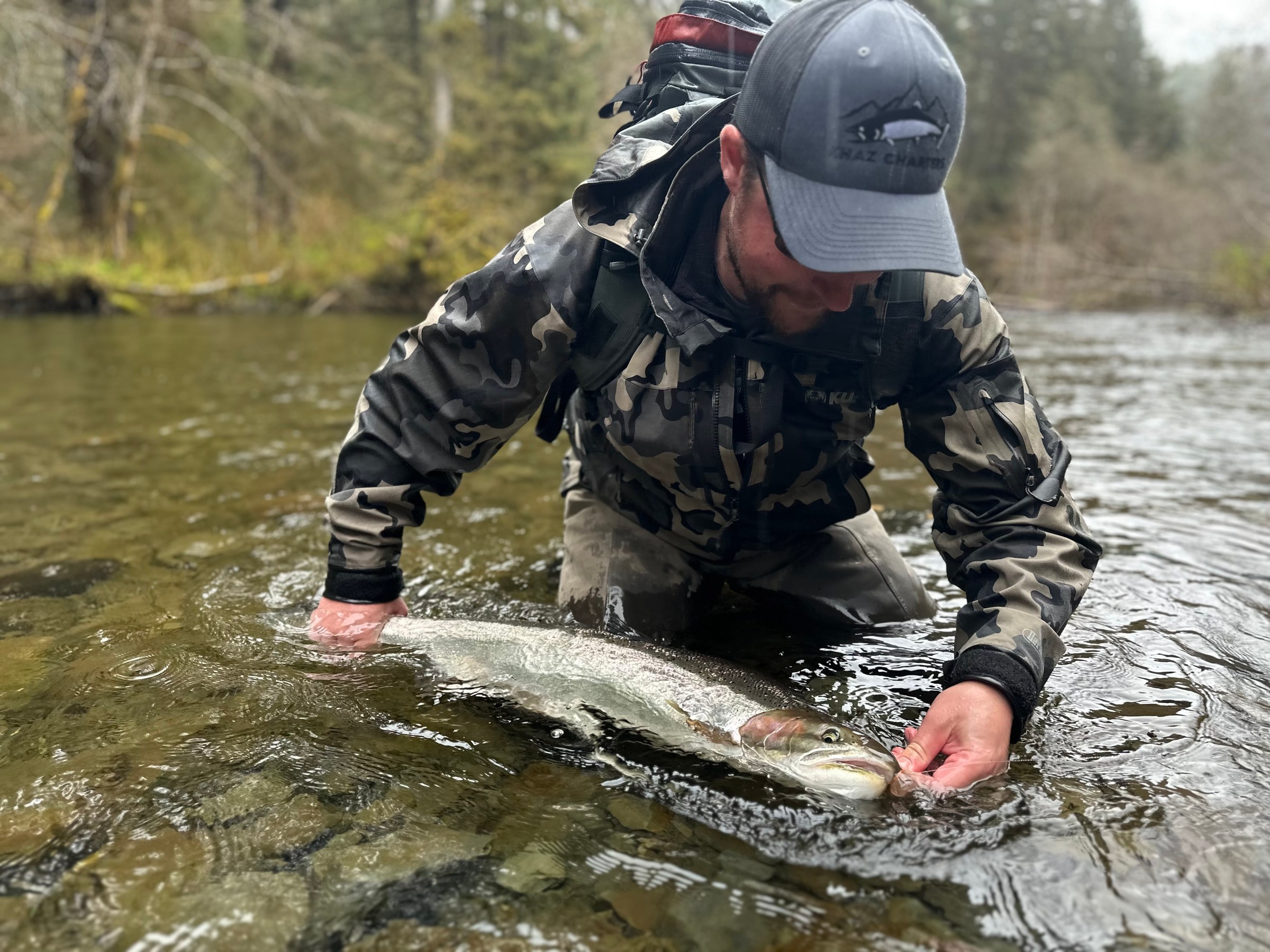a man riding on top of a body of water