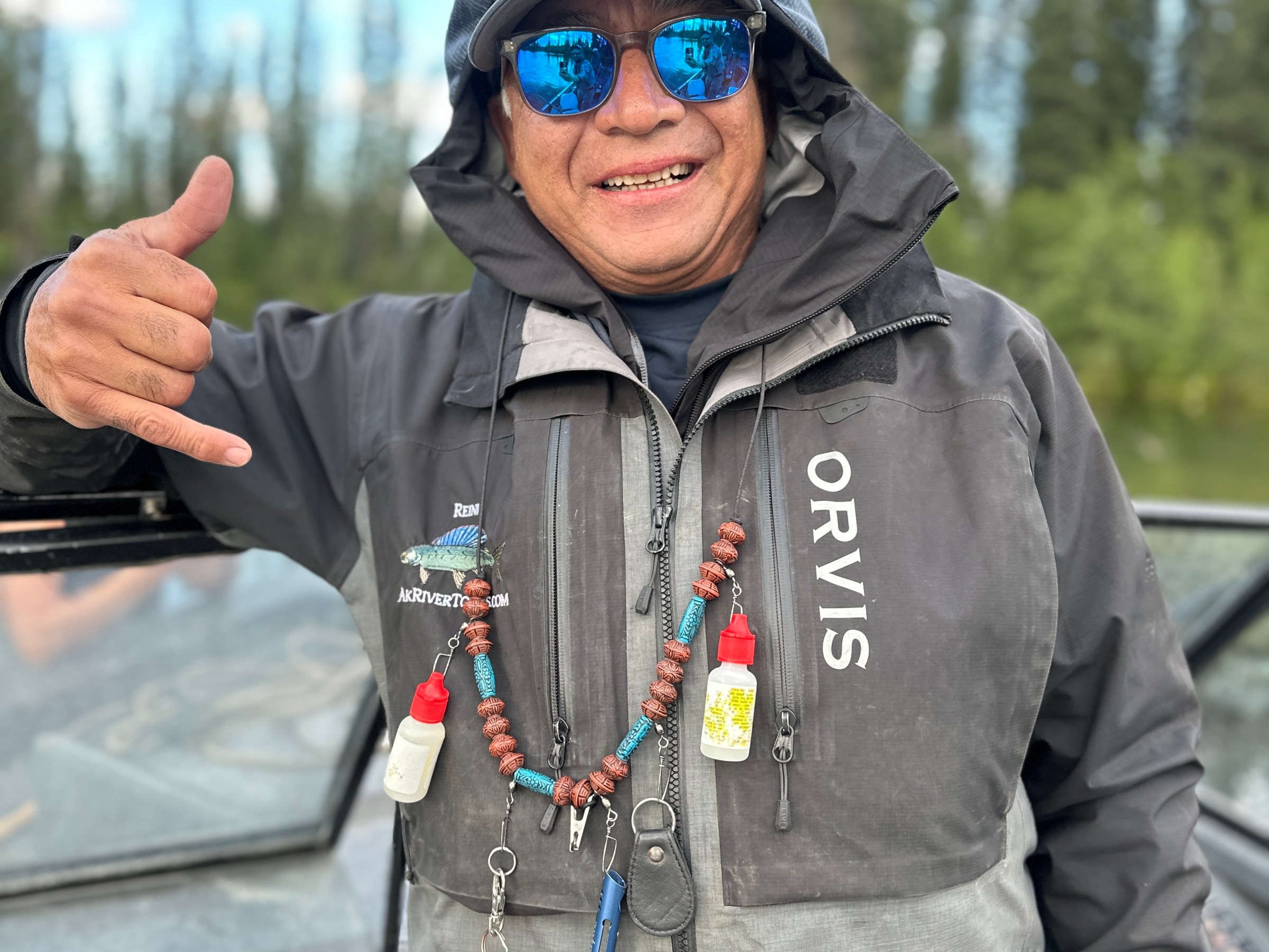 a man holding a fish